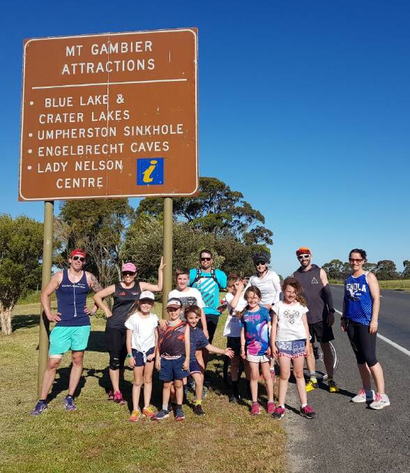 RUNNING MAN: Daniel Hackwell (far left) took on the challenge of a 100km run from Penola to Mount Gambier to raise funds for drought relief, and got plenty of support along the way.