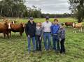 MAVSTAR/MAVGOLD: Simmental principals Ruby Canning, Ross Canning, Jacob Canning and Rita Canning with Thomas Clarke (left) at their Myamyn property. The stud's genetics date back to Rita's parent's Simmental stud, Maverick, from the 1970s. Pictured are some of their stud first-calving heifers, 12-24 months, in calf. Ruby said the stud had experienced great success with their home-bred progeny. The Mavstar stud is run by the Canning family, while Mavgold is run by Jacob who is in his final year at Monivae College.