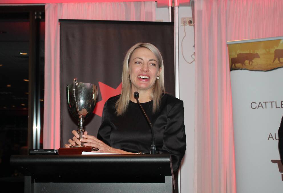 Elisha Parker from Clermont in Queensland accepting the Rising Champions trophy.