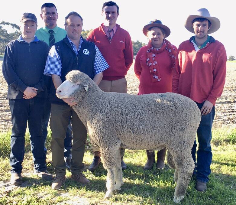 HILLS BOUND: Darcy Meyer, Mulloorie, Nutrien's Michael Lawrence, Brett Meyer holding the $4800 ram, Elders Keith's Sam Tooley and buyers of the top price ram Mandy and Alan Lintern, Tungkillo.