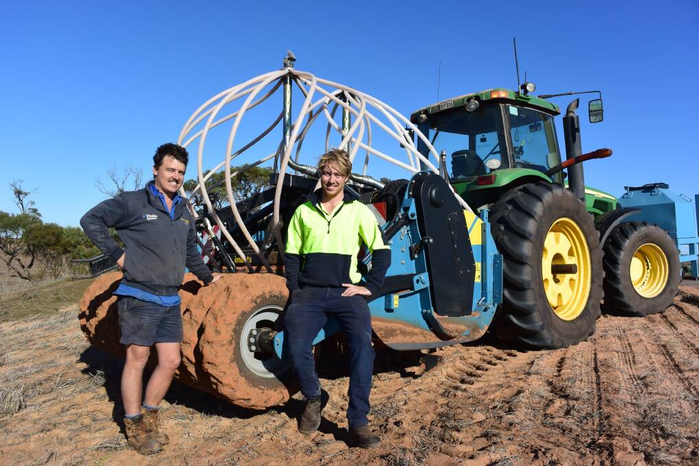 EFFICIENT MACHINE: Field Works SA contractor Aaron Jak and Bute cropper Tom Price, with Mr Jak's modified spader.