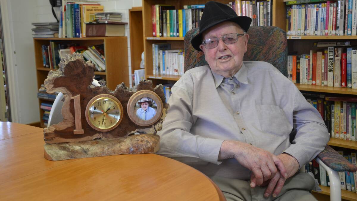 MILESTONE MAN: Clyde Atkins, Riverton, with a clock he received as a gift for his 100th birthday earlier this month. Clyde has spent the majority of his life working at his family farm, Stoneleigh, at Farrell Flat.