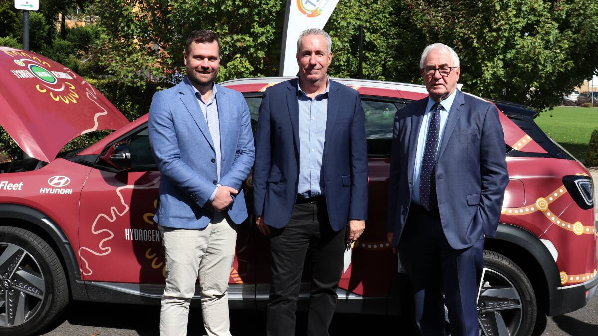 National Energy Resources Australia hydrogen general manager Leigh Kennedy, Toowoomba and Surat Basin Enterprise energy and new industries manager Reagan Parle, and Toowoomba Regional Council Mayor Paul Antonio with the hydrogen-powered car. 