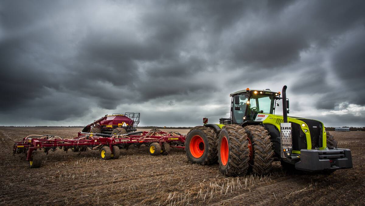 A Claas Xerion tractor pulling the Seed Hawk precision seeding system. 