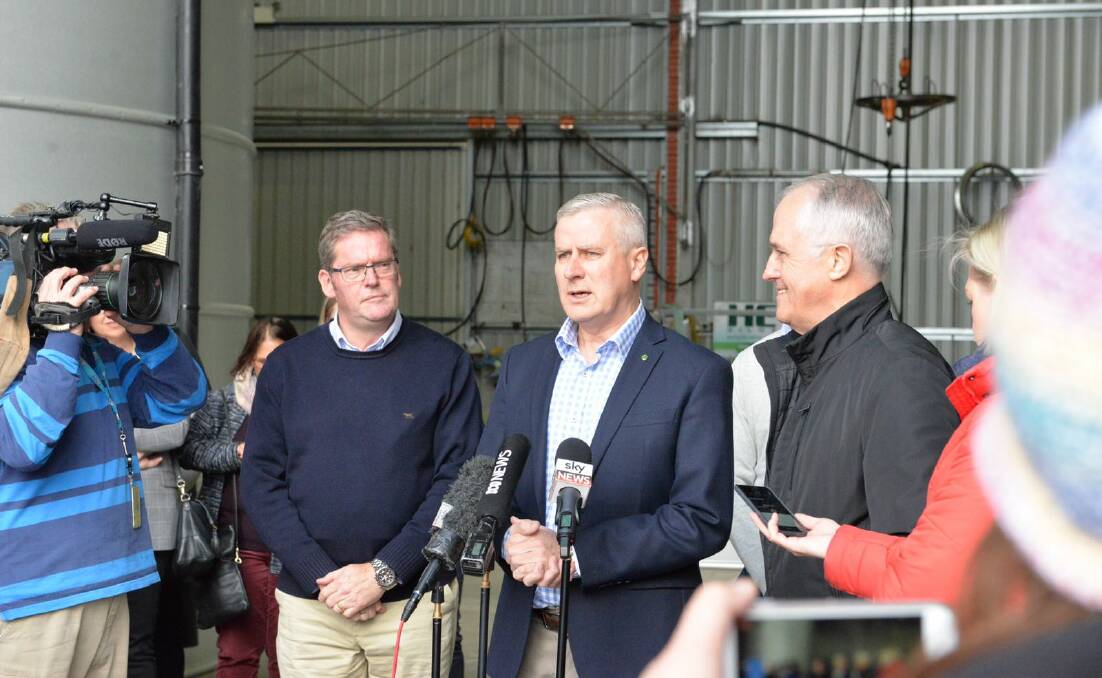 Regional Development Minister John McVeigh, Deputy PM Michael McCormack and PM Malcolm Turnbull announce their new drought support measures in Forbes on Sunday.