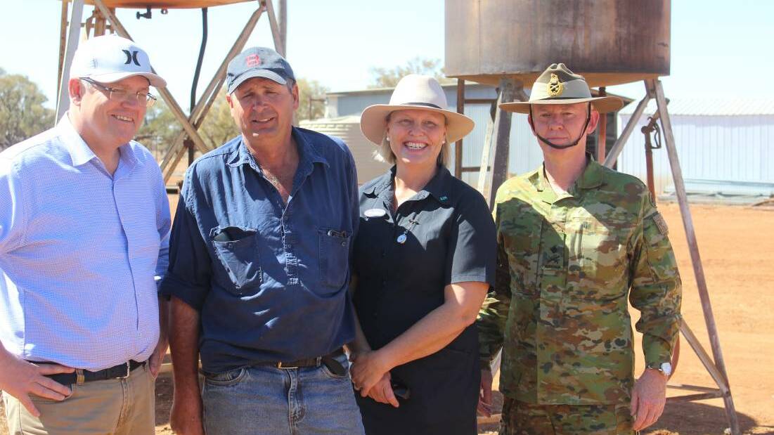  Prime Minister Scott Morrison with western Queensland graziers Stephen and Annabel Tully and Major General Stephen Day.