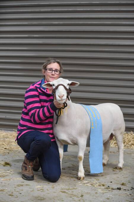 Andrea Vagg, Africans White Dorper stud, Moama, NSW, with the supreme champion White Dorper. Photo by Ruby Canning.