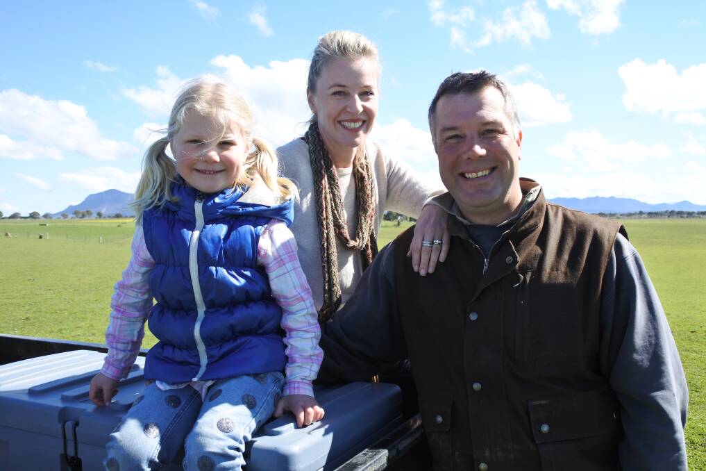 FIRST-CROSS PRODUCTION: To diversify their wool enterprise, Stacey and Luke Balkin, with their daughter Olivia, join about 3800 Merino ewes to White Suffolk rams to produce quality prime lambs at Glenthompson, Vic. 