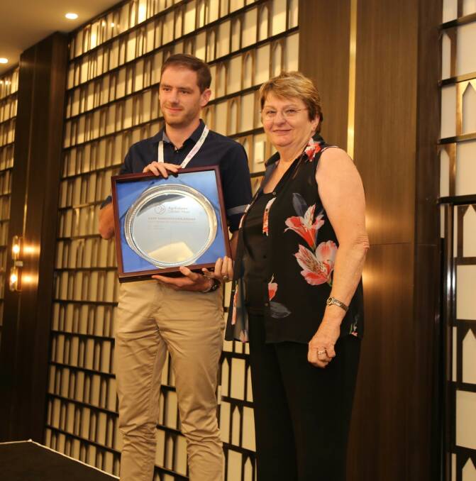 TOP HONOUR: Gary Sansom Scholar Joshua Angove with Julie Sansom at the Australian Poultry Science Symposium in Sydney. 