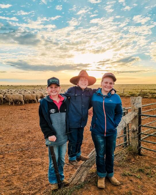 IN LIMBO: Willow, Sebastian and Westminster School student Grace Wakefield at their White Cliffs station in NSW. Grace has now begun 14 days of quarantine.