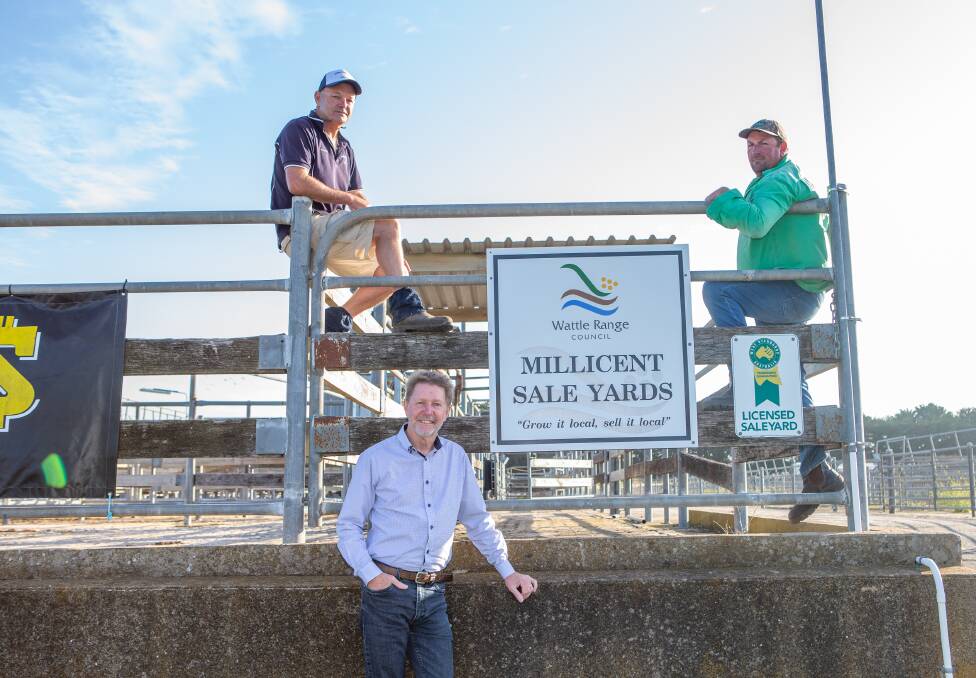 DEAL MADE: Livestock agent John Chay, Millicent saleyard manager Andrew Robinson and (front) Wattle Range Council's Roger Babolka. 