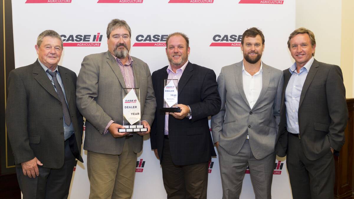 AWARDS NIGHT: Ramsey Bros management, Eddy Ward, Mark Ward, Tim Glover, Linc Ramsey and Neil Holthouse, proudly display the National Case IH major Dealer of the Year award.