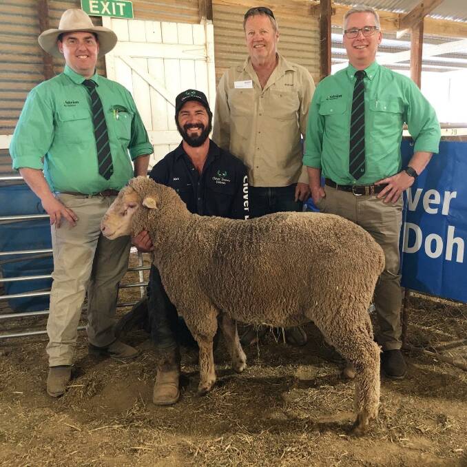 Herb Hyde (second from right), Loxton, was the volume buyer at Clover Downs. He is pictured with Nutrien's Peter Marschall, CD principal Alex Mattschoss and Nutrien's Gordon Wood.