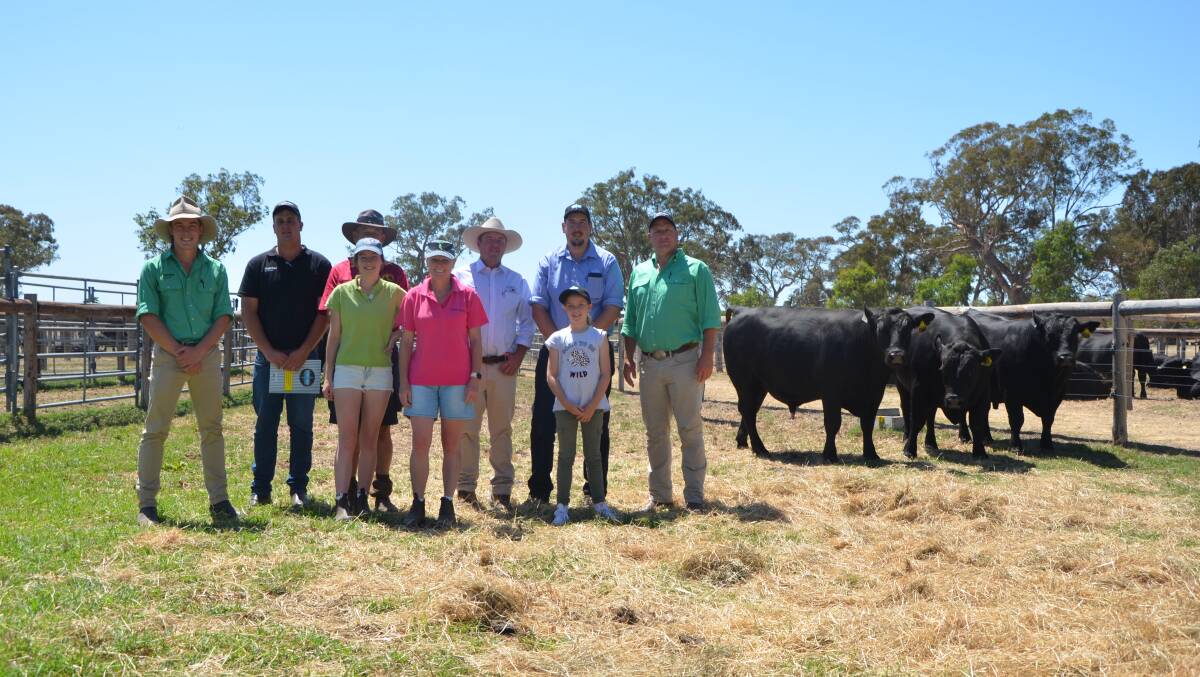 GOOD BUY: Nutrien's Jack Guy, Bradley Walker and Anthony Driessen (far right), with top price bull buyers Colin, Jessie and Sally Grundy, Mundoo Pastoral, Spence Dix & Co's Jono Spence, Stoney Point manager Peter Colliver and Stoney Point manager Perry Gunner's granddaughter Imogen Hay.
