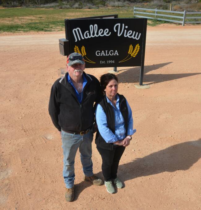 FED UP: Kevin and Raelene Heidrich are considering their long-term view at 'Mallee View', following the latest in a long-term string of mining proposals on their property.