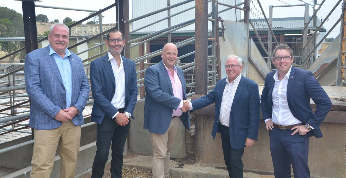 Member for Hammond Adrian Pederick and Primary Industries Minister David Basham (centre) announced $1.5m in funding for the Fleurieu Community Co-operative on Wednesday and are pictured congratulating the FCC board Grant Baker, chairman David Parsons and Steven Russo.