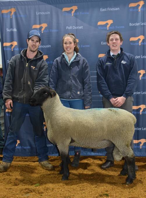 Jordan and Chelsea Galpin with TDC Penola's Hayden Lambert and one of the $1800 top price Suffolk rams at Warrawindi's 2019 sale.