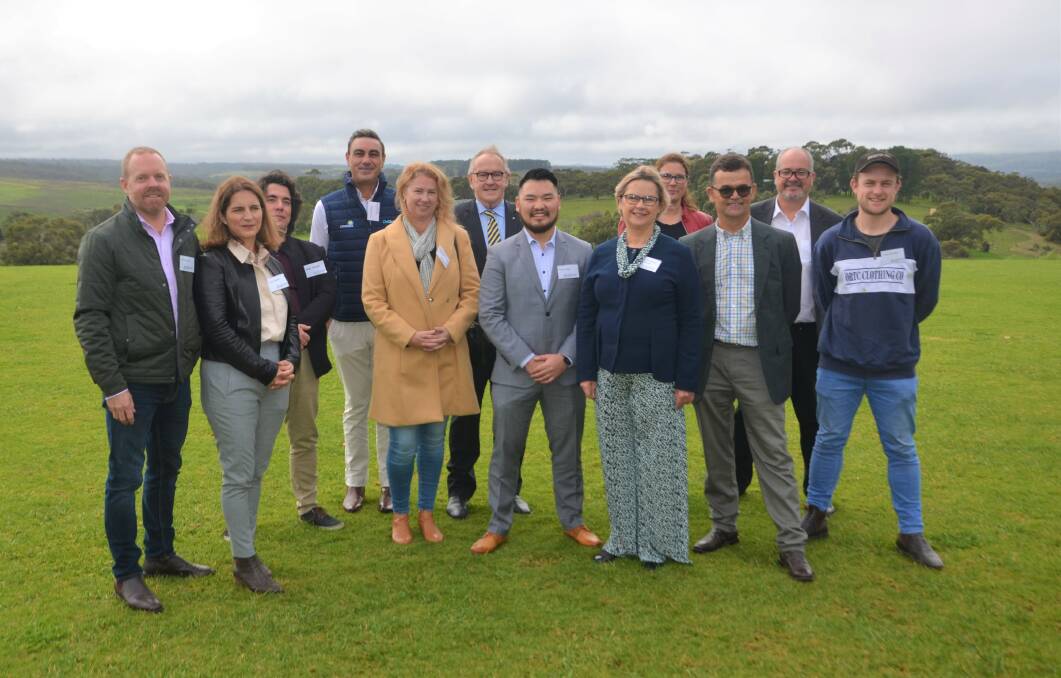 AgTech Growth funding recipients were congratulated by Primary Industries Minister Clare Scriven (fifth from right) and Member for Mawson Leon Bignell (second from right) at the funding announcement at McLaren Vale.