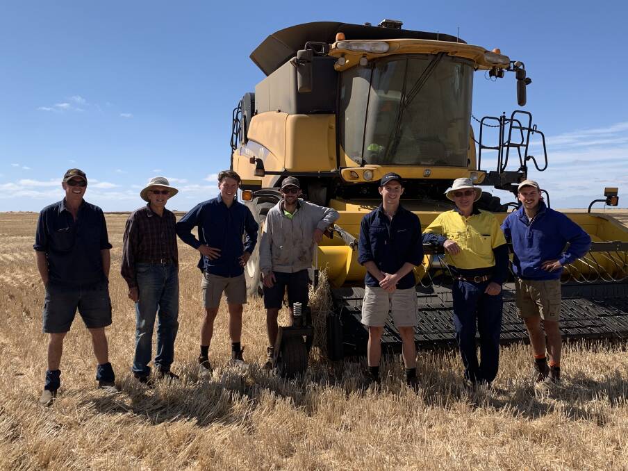 Chris, Deane, Max, Alex, Harry, Andrew and George Litster after reaping their final barley paddock in December.