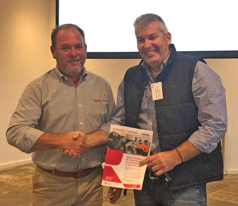 Ramsey Bros sales manager Tim Glover and ATASA president Damien Brookes celebrating the launch of the Year 12 Award for Outstanding Achievement in Agriculture.