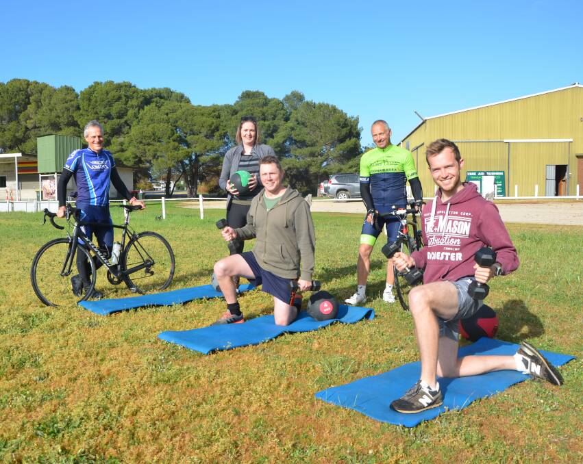 IN SHAPE: Group fitness instructor Belinda Freund (second from left), with local farmers and fitness session regulars Gavin Lutze, Steve Schilling, Richard Schilling, Coonalpyn, and Harrison Rowntree, Netherton.