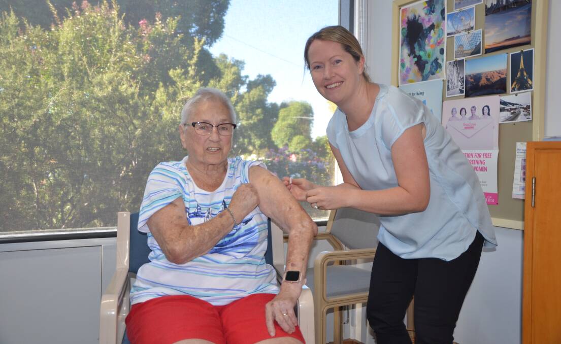 EAGER: Tanunda's Fern Fyfe was the first to receive a vaccination from Natalie Payne at the Tanunda Medical Centre in phase 1B of the COVID-19 vaccine rollout.