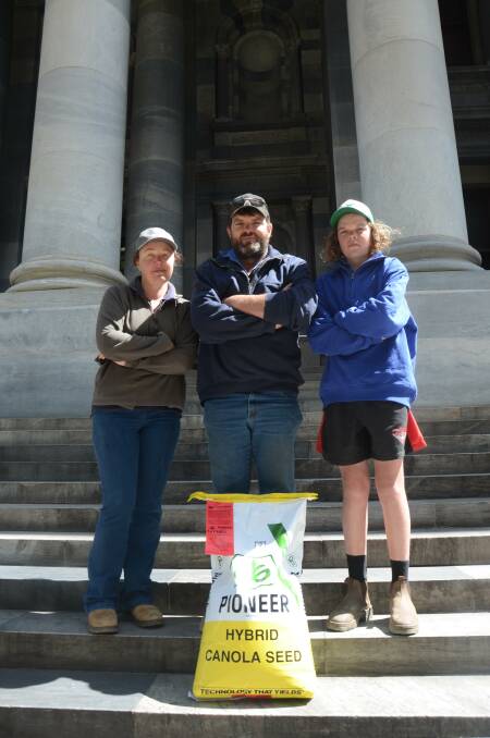 CHOICE: Eudunda graingrower Anthony Pfitzner, wife Linda and son Cooper, 14, took to the steps of parliament to voice their support for the bill that would overturn the GM ban, saying grower choice was the major reason the moratorium should be lifted.