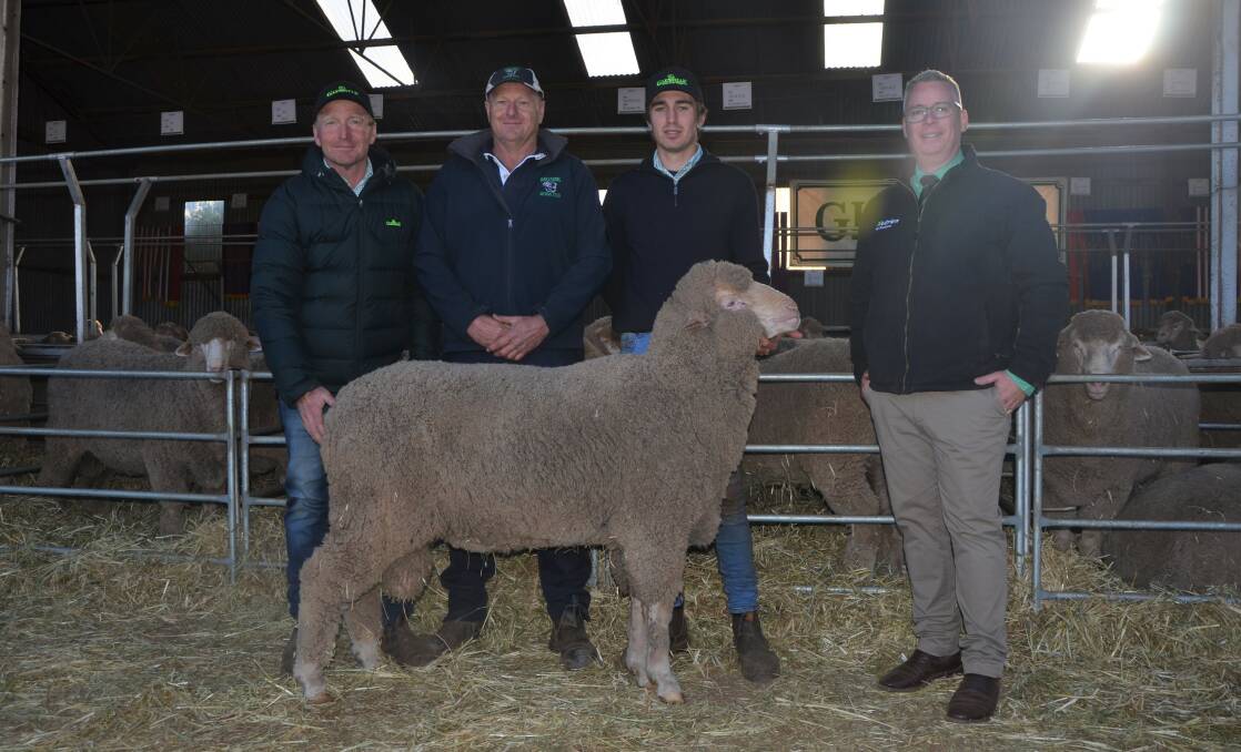 STUD BUY: Glenville principals Daryl and Klay (second from right) Smith congratulate top-price ram buyer Nick Lienert, Oak Farms Merino and Poll Merino Stud, Buckleboo, on his purchase. Nutrien's Gordon Wood was the auctioneer for Glenville's sale.