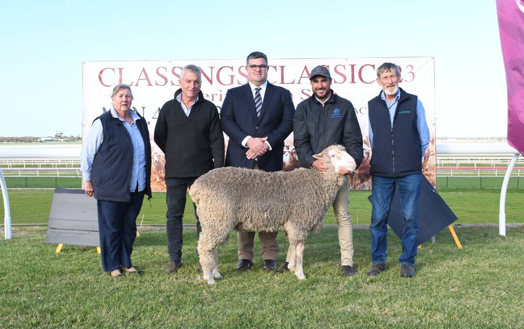 Judy and Keith Paech (far left and far right), Lucernbrae, Callington, were part of a syndicate to buy this $25,000 Baderloo ram. With the ram are Classings Limited Bill Walker, Quality Livestock's David Whittenbury and Baderloo principal Daniel Hammat.