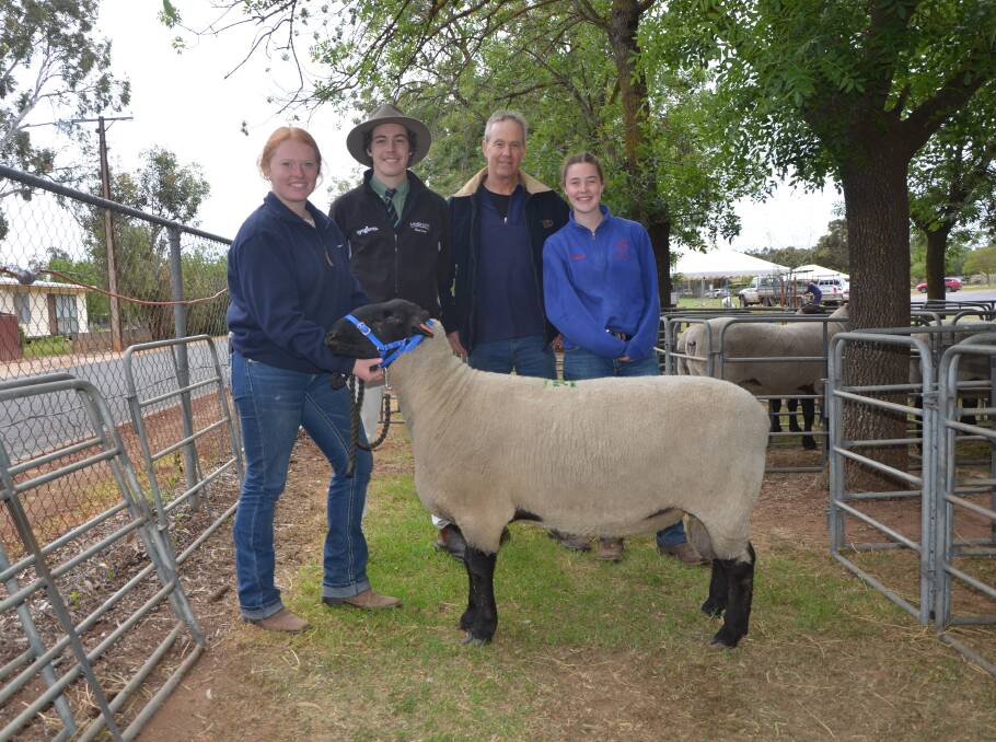 STUD SALE: The $1500 Suffolk ram which topped the Fleurieu Prime Ram sale on Tuesday is held by Urrbrae Agricultural High School student Grace Oakley-Birrell, Meadows, with Landmark Strathalbyn's Jack Guy, UAHS farm instructor Kym Tiver and UAHS student Georgia Powell, Harrogate.