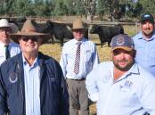 Goolagong's Brian and Heath Tiller (front), Warnertown, were volume buyers at stage two of the Stoney Point Performance Angus dispersal, buying 53 females in total.
372 females, auctioned by Nutrien's Gordon Wood and Spence Dix & Co's Jono Spence (back), averaged more than $8000 which left stud manager Peter Colliver (back right) ecstatic.