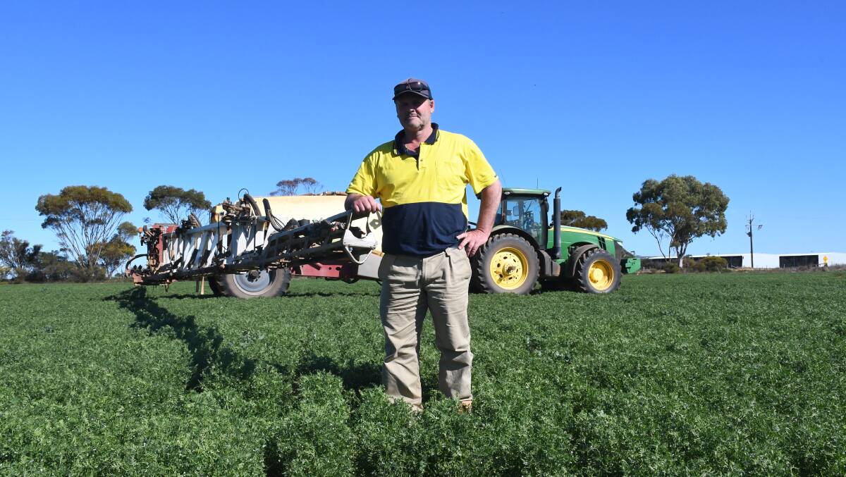 Paul Daniel, pictured spraying lentils at Bowmans this week, says a cease harvest threshold of 28 GFDI measured at 2m would be problematic for croppers with country near the coast.