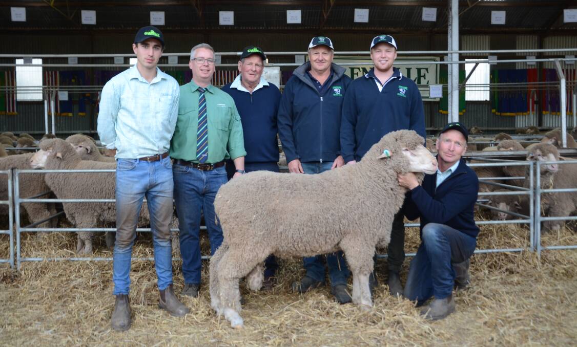 SALE TOPPER: The $7800 top price ram bought by Nick and Harrison Lienert (third and second from right), Oak Farms Stud, Buckleboo. With them are Glenville's Klay Smith, Landmark auctioneer Gordon Wood, Glenville's Barry and Daryl Smith (crouching).