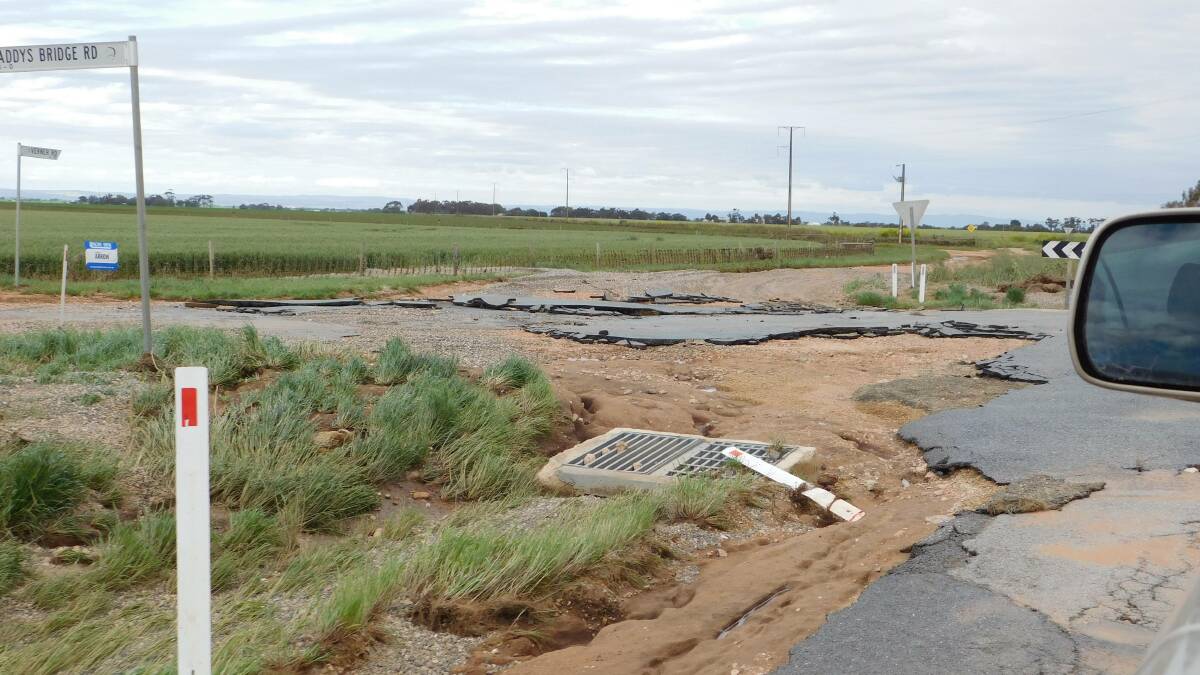 UTTER DESTRUCTION: The floods tore up nearby roads.