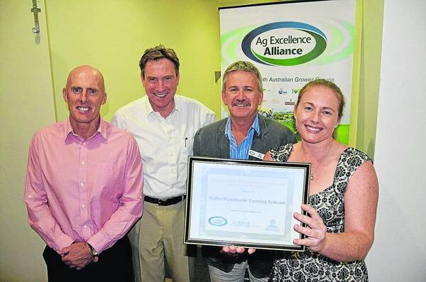 TOP AWARD: At the Ag Excellence Alliance annual forum on Monday night were guest speaker and former VFL footballer Mark McKeon; Department of Environment, Water and Natural Resources chief executive officer Allan Holmes; Ag Ex chairman, Bill Long and accepting the grower group sustainability award was Mallee Sustainable Farming’s Gemma Walker.