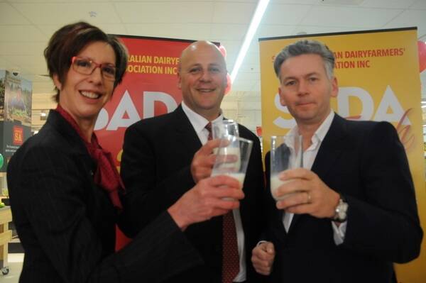 HERE'S CHEERS: SA Minister for Agriculture Gail Gago, SADA president David Basham and Coles chief operating officer John Durkan at the launch of SADA Fresh this morning. 