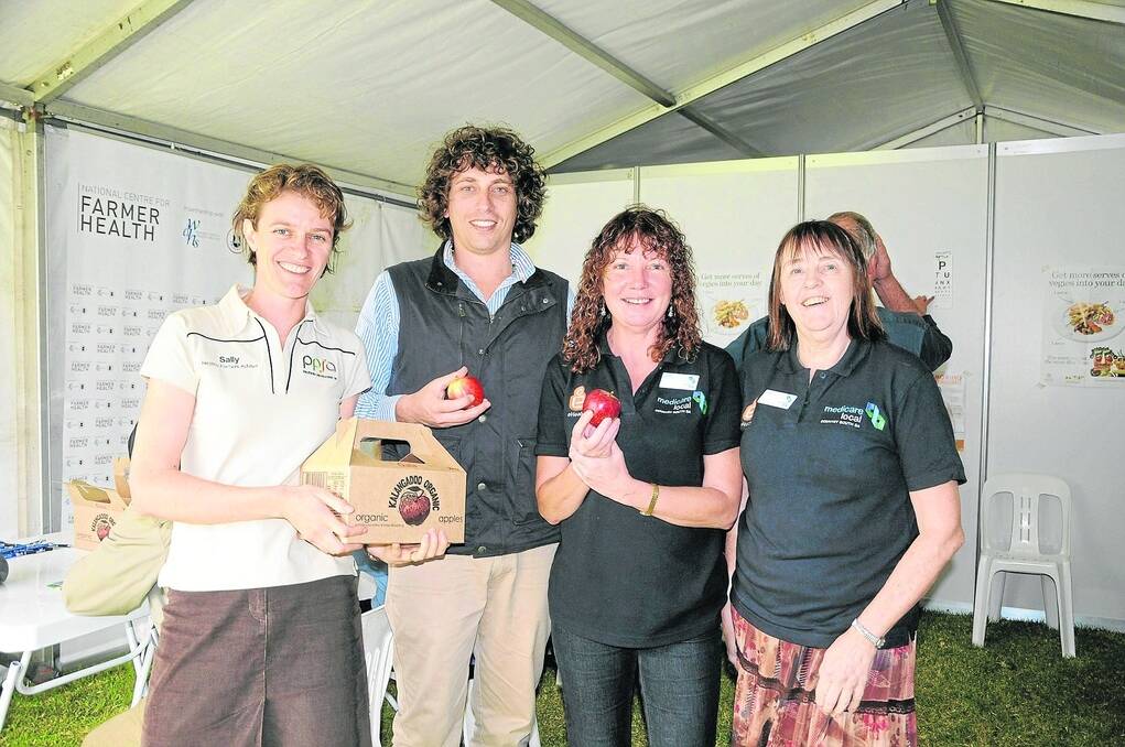 ON THE PULSE: Primary Producers SA healthy farmers adviser Sally Fisher, Western District Health Service’s Adrian Calvano and Medicare Local’s Jenni Williams and Chris Lacey undertook free health assessments at the South East Field Days last month.
