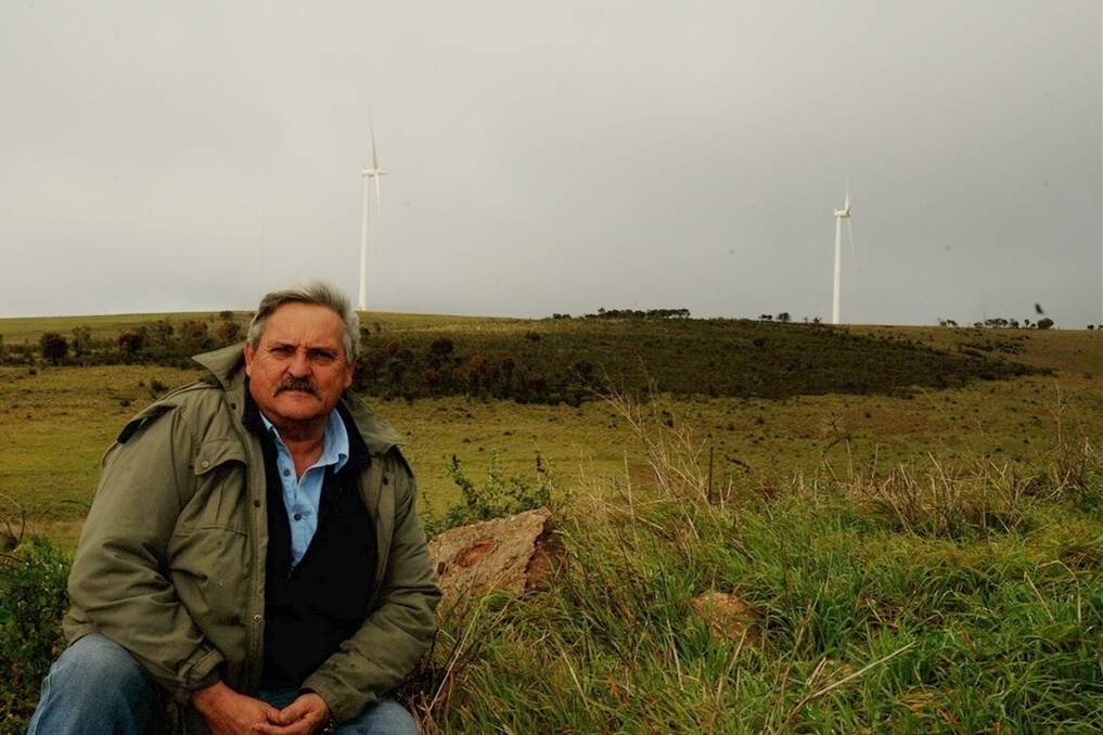 TURBINE POWER: Snowtown landholder Neville Michael now has 16 turbines built by Trust Power on his land, which he also leases to another sheep farmer. He says the windfarm, owned by New Zealand-based company Trust Power, resulted in a network of new roads being laid throughout the hills which also acted as firebreaks.