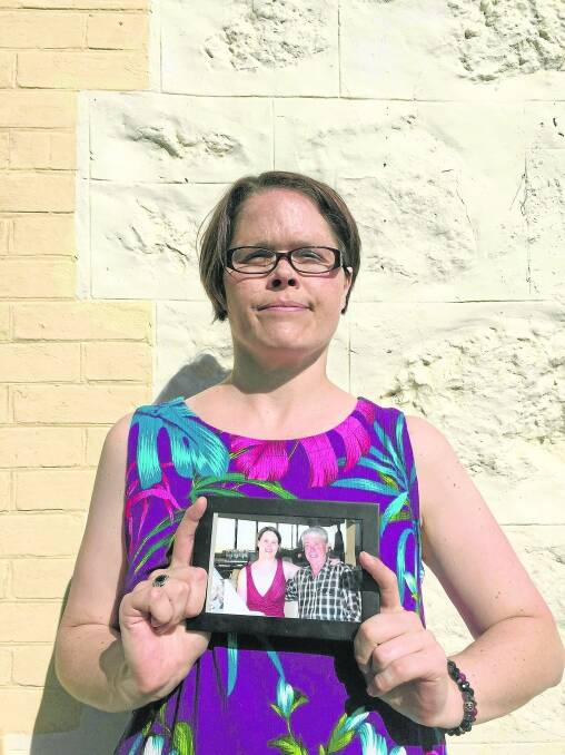 SOS Yorkes secretary Tessa Colliver holds up a photograph of her father Gary who took his own life in 2006. She says it is important to talk openly about mental health issues to breakdown stigma.