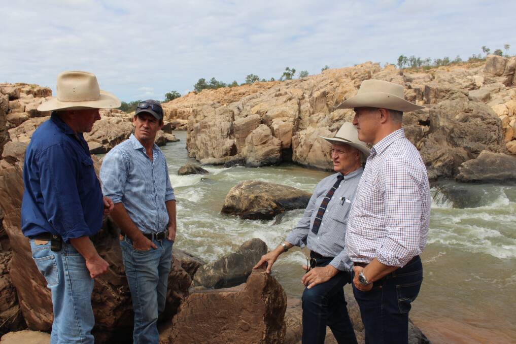 Charters Towers grazier Blair Knuth, with KAP Townsville candidate Josh Schwarz, talking with Bob and Robbie Katter at the site of the soon to be constructed Big Rocks Weir.
