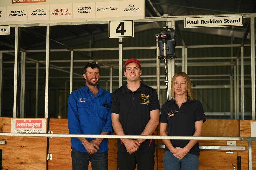 Jamestown nationals committee chair Matt Scharkie, Jamestown local shearer and SA open shearer 2022 Beau Growden, and Jamestown nationals committee secretary Steph Lunn stand in front of the shearing deck at the Jamestown Heiniger Shearer Training Centre. Picture supplied