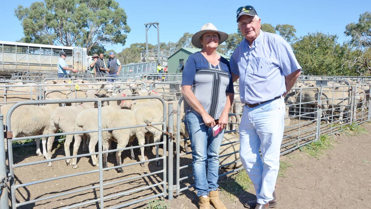Livestock buyer Kaye Bottrill, bought  this pen of crossbred lambs for ALC. She is pictured with TFI livestock buyer Ian Smith.