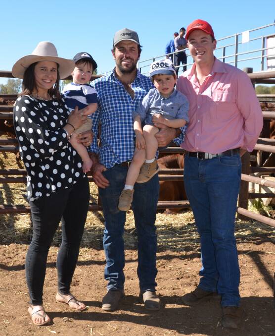 NT EVENT: Georgina Hamlyn with her fiance Brad Vickers, Delmore Downs, via Alice Springs, NT, and William Vickers, 1, and Henry Vickers, 3, and Elders' Ronnie Dix.