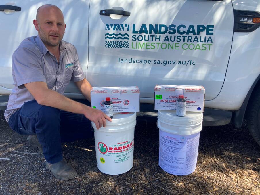 Limestone Coast Landscape Board Landscape Officer Saxon Ellis with tools of the trade for rabbit baiting.