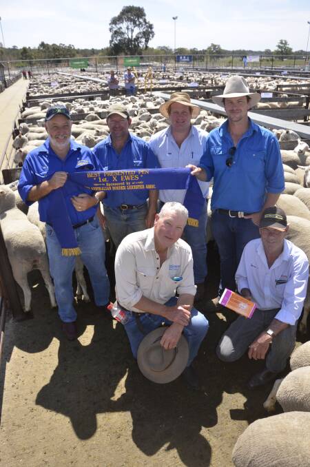 With the best-presented ribbon were Australian Border Leicester Association secretary Ian Carr, Thomas Foods International Rural farm manager Andrew Kellock, TFI Rural buyer Matt Heinrich and Coolawang stud's Lachie James. Pictured front are Coolawang's Trevor James and Zoetis livestock representative Gary Glasson.
