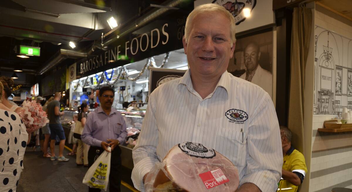 WINNING WAYS: Barossa Fine Foods managing director Franz Knoll with the award-winning ham from his family business. Australian PorkMark Award judges said it was well balanced, with mild flavours and smoke. 
