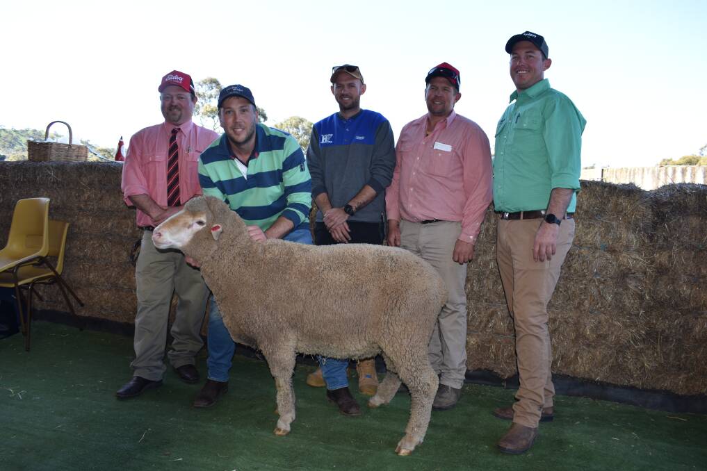 Elders Burra's Michael Foster, Ulooloo principal Rob Hall and the lot 40 ram which made $3800, buyer Hillview Dohne stud principal Robert Holmes, Chilpenunda, Elders Streaky Bay Milton Holmes and NutrienAg Solutions Jamestown's Shannon Jaeschke. Picture by Kiara Stacey