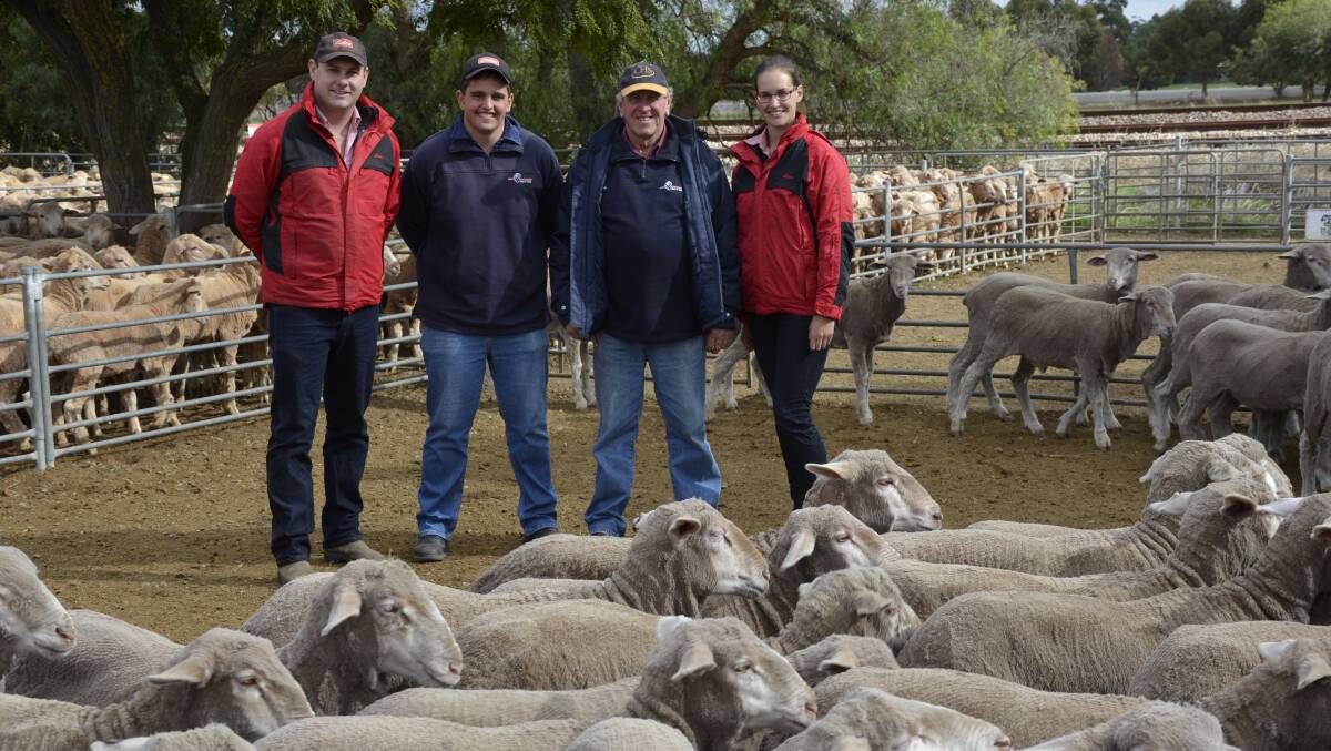 Elders Eudunda livestock agent Paul Kilby, with father and son Luke and James Sander, Eudunda, who sold wethers for the top price of $125, and Elders livestock production advisor Emma Shattock. 