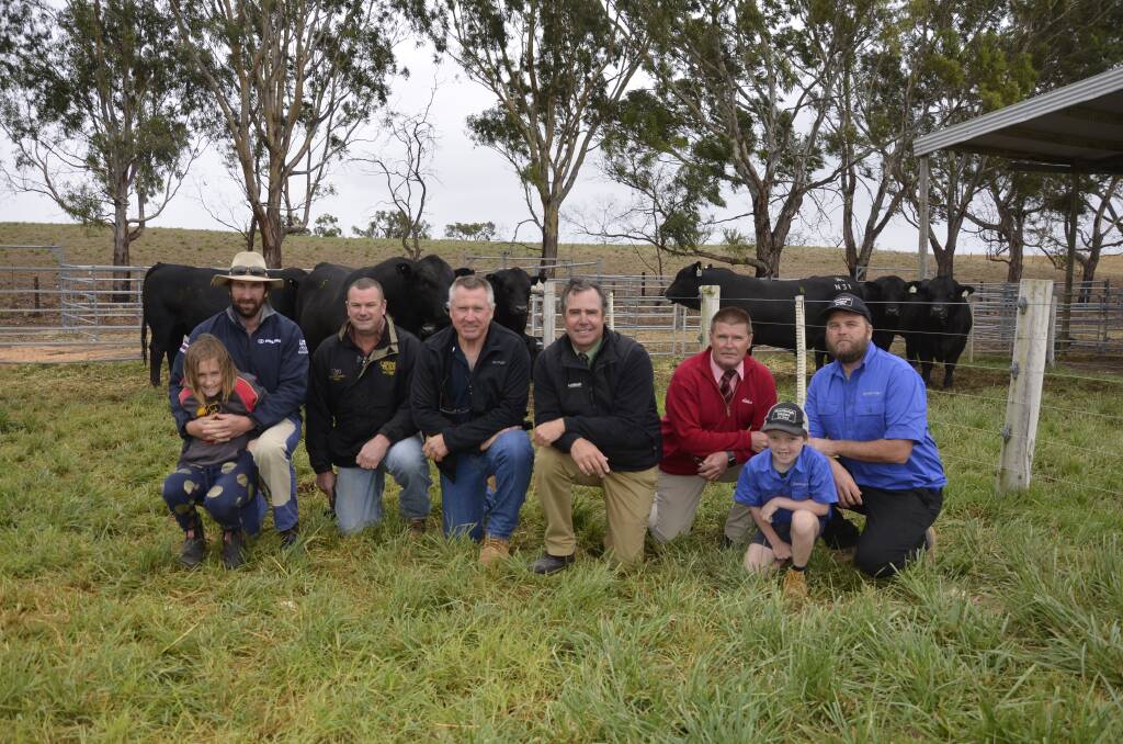 One of the top price buyers Nathan Nutt, Keith, with his daughter Holly, 10, the other top price buyer Josh Densley, Black Range Partners, Keith, Rodwells Keith agent Craig Escott, Landmark stud stock's Richard Miller, Elders stud stock's Tony Wetherall and Roseleigh co-principal Mat Cowley and his son Nate, 8.