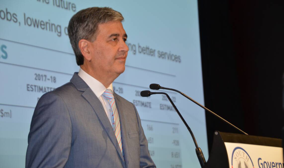 STATE FINANCES: Treasurer Rob Lucas handing down the 2018-19 state budget in Adelaide on Tuesday. The budget has received generally positive feedback from regional SA.